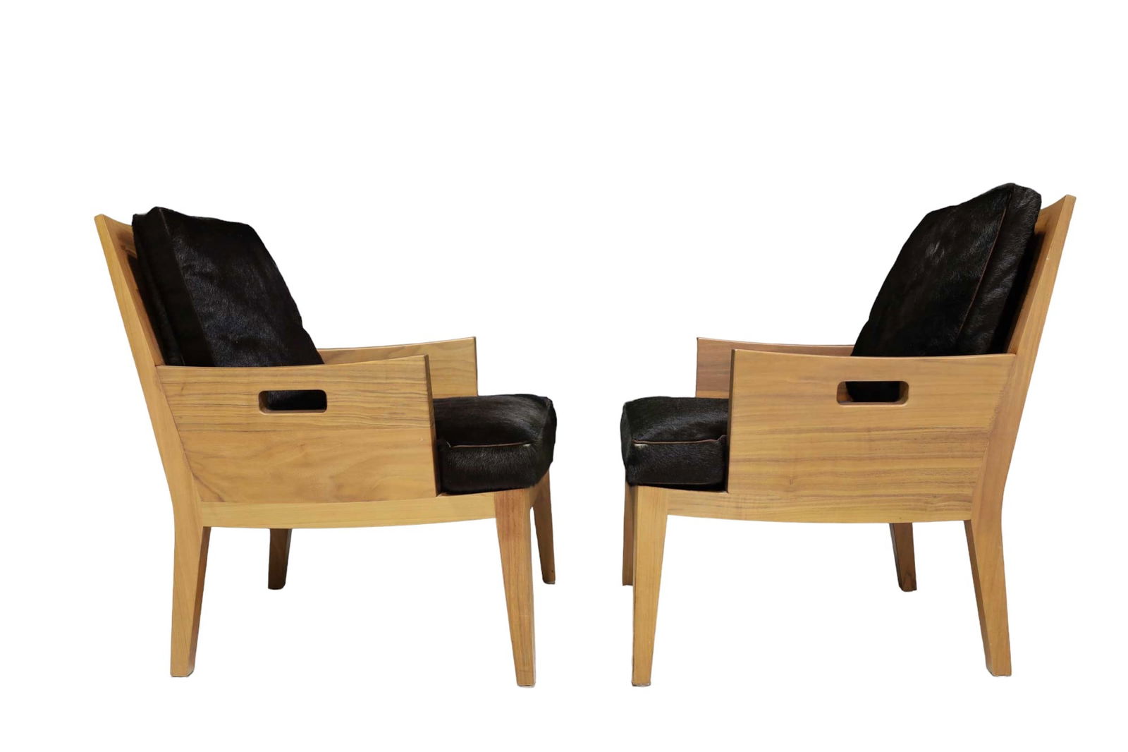 Flexform "Betty" Chair with Solid Wood Frame and Hair on Hide Cushions: Flexform "Betty" Chair, a true gem for modern design enthusiasts. Made in Italy, this exquisite chair features a solid Canaletto walnut wood frame and luxurious black hair on hide cushions, epitomizin