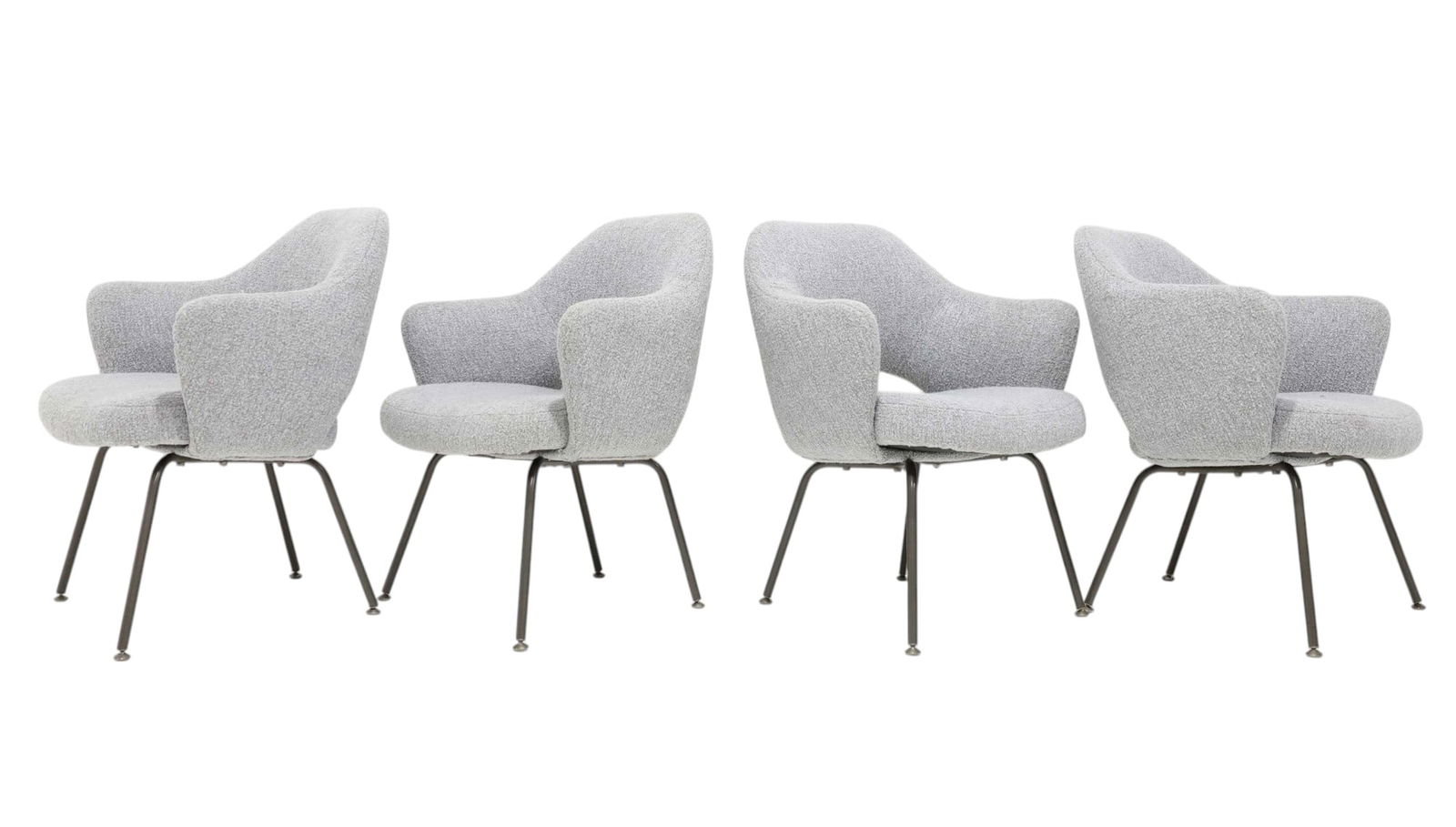 Eero Saarinen Executive Chairs Mid Century Modern Furniture: This iconic piece is not only comfortable and stylish but also fits any table gracefully and is easy to move around. Upholstered in high-quality Holly Hunt performance fabric.