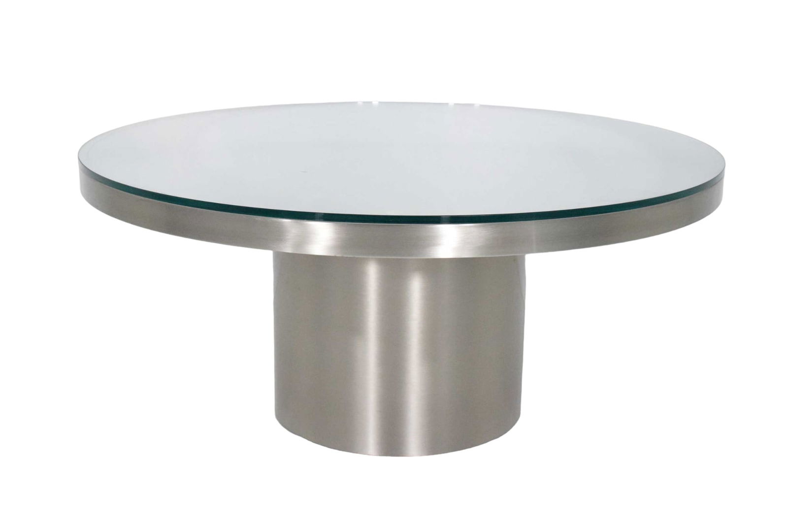 Stainelss Steel Pedestal Base Coffee Table by Brueton: Polished stainless steel base with glass top. In beautiful condition.