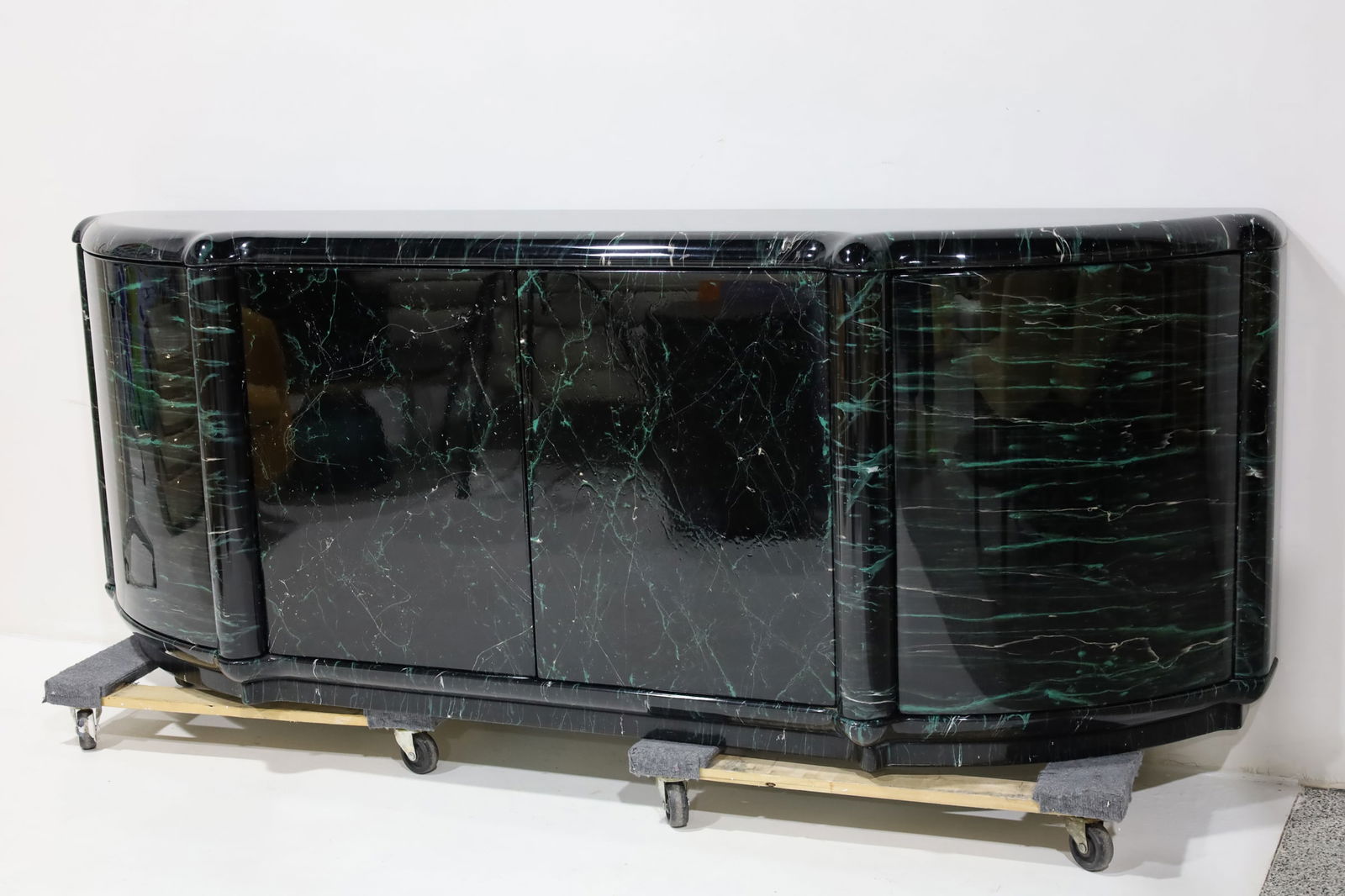 Large Italian Sideboard in Lacquer: Great quality, this piece is very heavy. Lacquered in green, black and white. Sideboard has four doors that open to shelving. Back is finished.