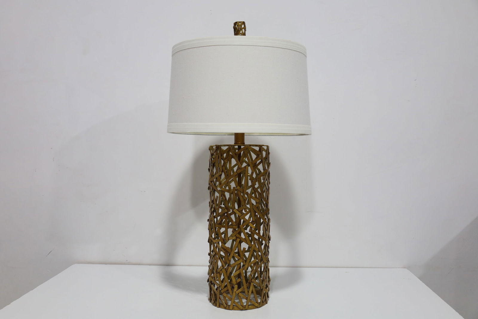 Brass Finish Lamp with Shade: Modern brass finish lamp with cross hatching design. Incudes shade. Measurement includes shade.