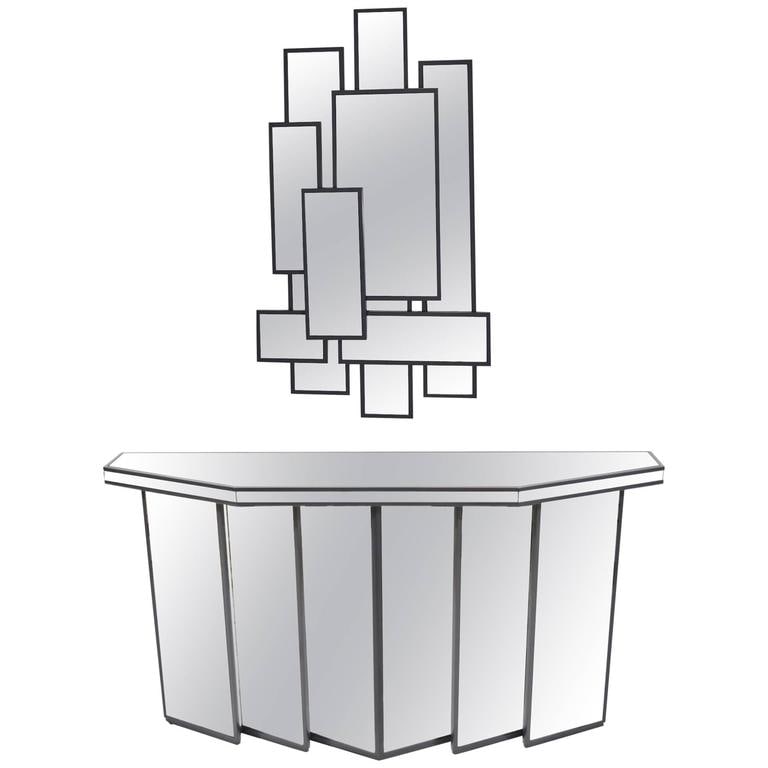 Mid-Century Faceted Console with Cubist Mirror: Console and mirror are trimmed in wood that has been lacquered in a dark grey. Mirror has some age spots but piece is very nice and there are no chips or cracks. Measurements are for console.