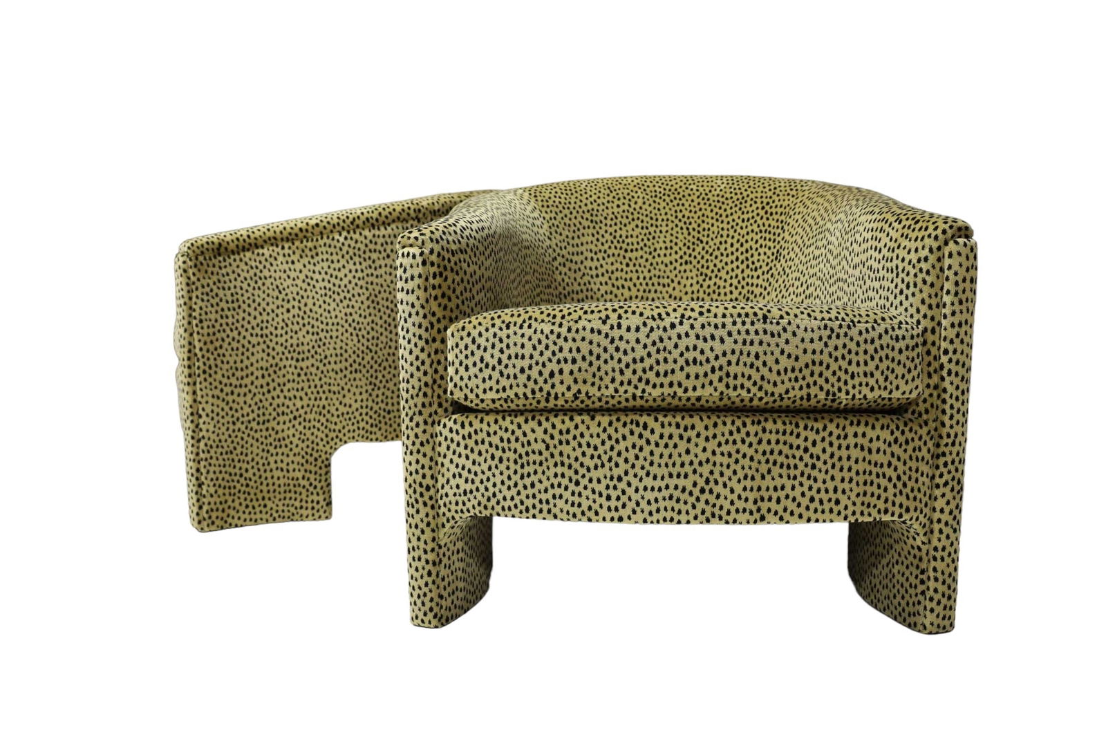 Pair of Vladimir Kagan Style Tub Chairs in Cheetah Print Velvet: Pair of Vladimir Kagan Style Tub Chairs. These striking chairs feature a luxurious cheetah print velvet, making them a captivating addition to any room. Their impeccable mid-century modern design, com