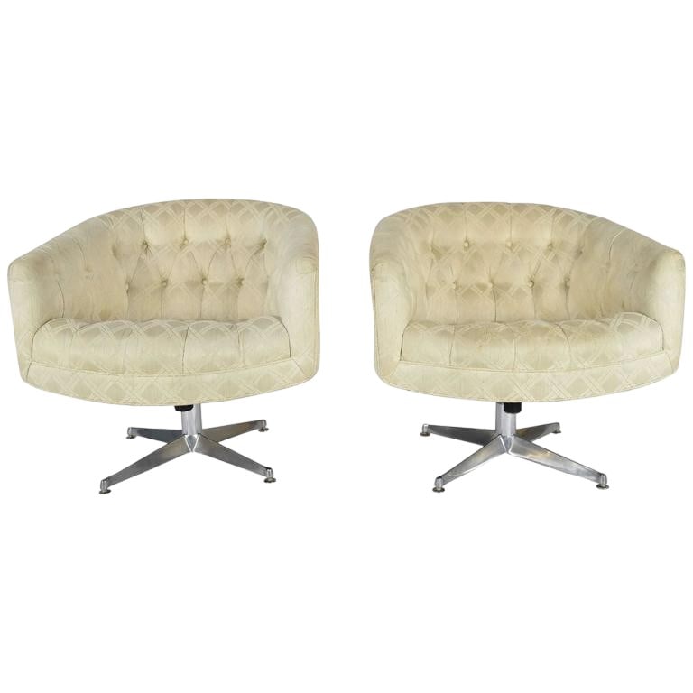 Pair of Ward Bennett Style Swivel Lounge or Office Chairs: Great for an office of for lounge chairs. Swivel base in steel, tufted uphosltery. Would benefit from new upholstery.