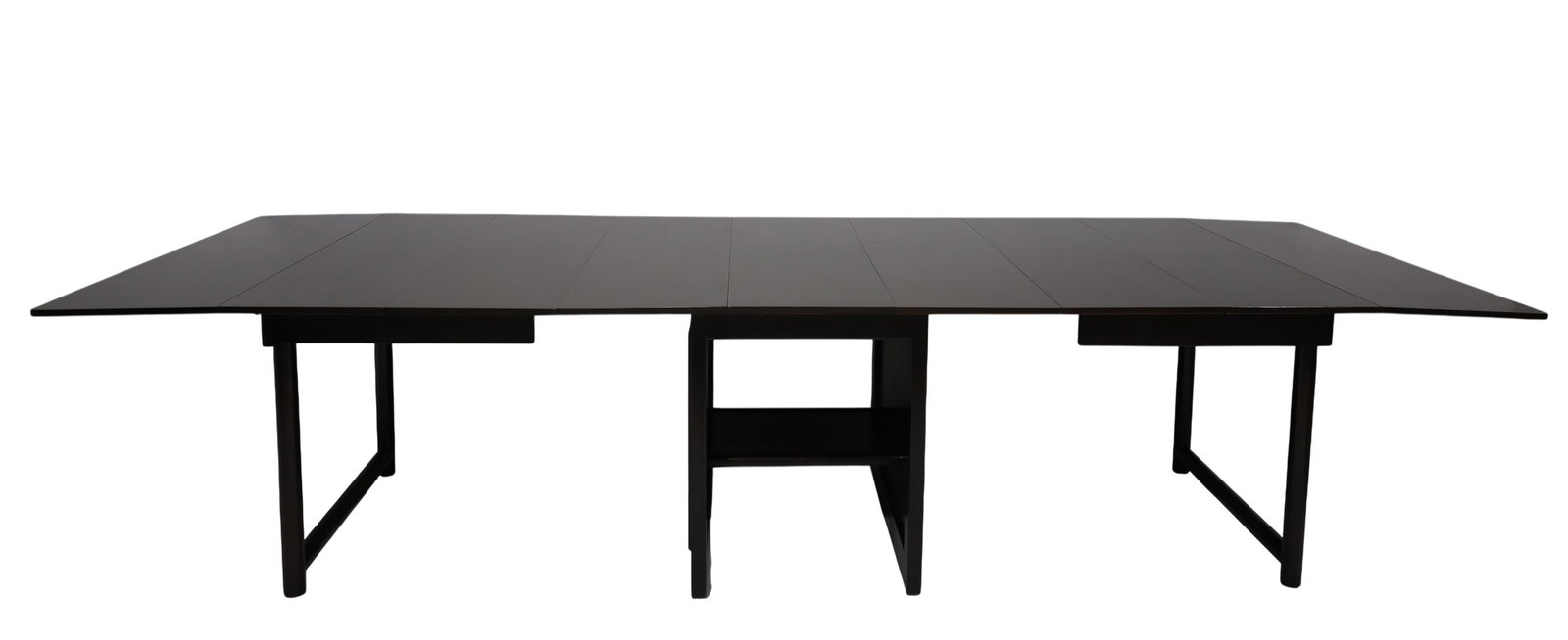 Edward Wormley for Dunbar Model 4576 Dining Table: Designed by Edward Wormley for Dunbar, this beautiful mahogany dining table extends to 126 inches. The drop leaf table measures 29"W x 42"D x 29"H. It includes 5 leaves in the original box that are 14