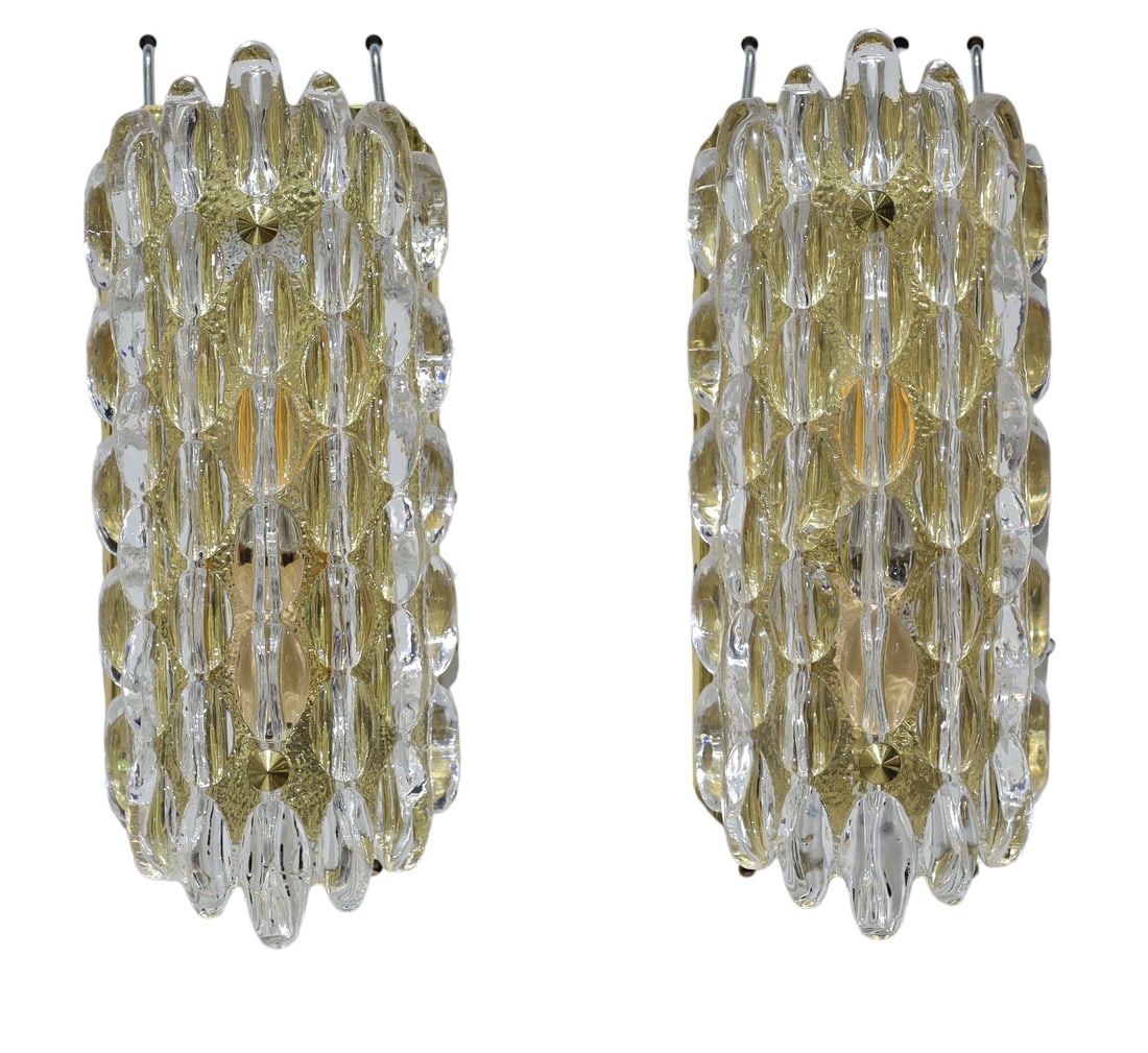 Karl Fagerland for Orrefors Bubble Crystal Wall Sconces: Pair of thick crystal bubble lamps designed by Karl Fagerland for Orrefors, 1950s. These exquisite wall sconces embody the timeless elegance of quality design.