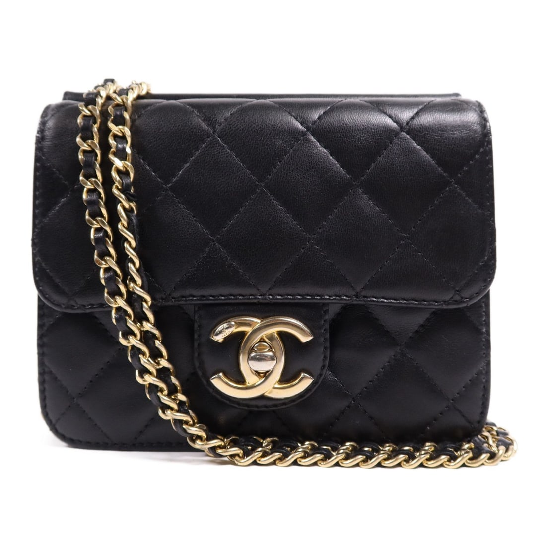 Chanel Black Calfskin Handbag: Chanel black calfskin leather chain shoulder bag with turn lock closure, outside and inside open pockets. Dimensions are W:15.5cm x H:12cm x D:3.4cm, strap drop is 115cm. Includes dust bag and hologra