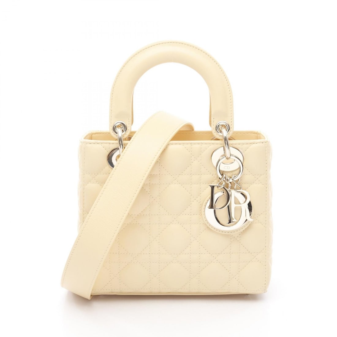 Dior Handbag: Dior Ladies Christian Dior Small Cannage Handbag in yellow leather with Cannage pattern. Includes shoulder strap. Dimensions: W: 20cm, H: 17cm, D: 8cm.
