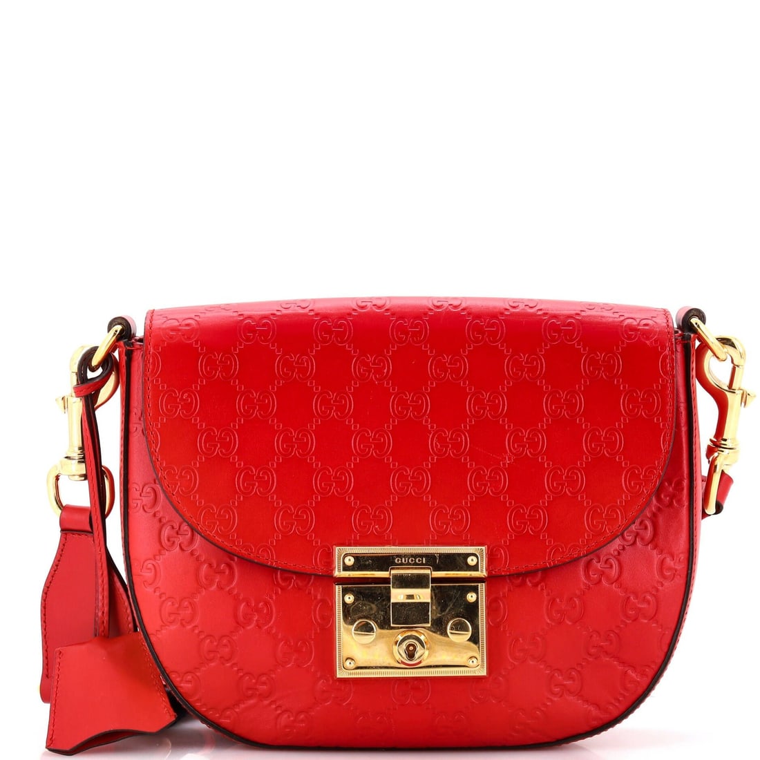 Gucci Red Leather Padlock Saddle Handbag: Gucci Padlock Saddle Shoulder Bag in red Guccissima leather, medium size, with shoulder strap and gold hardware.