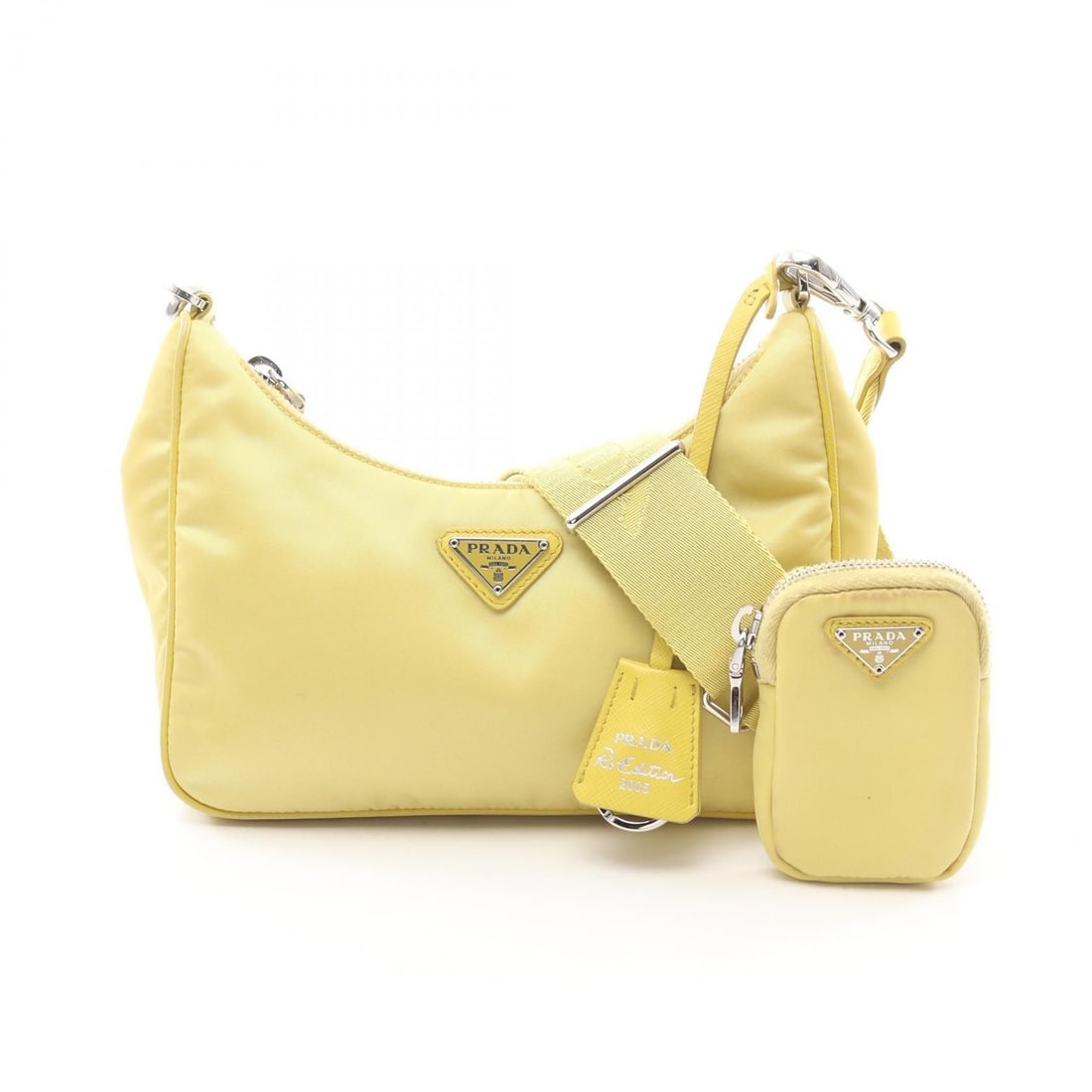 Prada Yellow Re-Edition 2005 Handbag: Item Name: PRADA Re-Edition 2005 Shoulder Bag Yellow Nylon 1BH204Brand: PRADAModel No.: 1BH204Size: x W:22cmH:12cm x D:6cm(W:8.7 inch x H:4.7 inch x D:2.4 inch ) - 46cm-18.1 inch )Color: