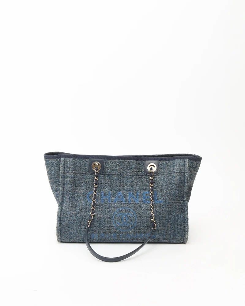 Chanel Deauville Pm Tote Bag: CHANEL Deauville PM Tote Bag- Silver-tone hardware- Blue glittered tweed- Dual shoulder straps with chainlink detail- Blue cloth lining with three pockets- VintageOverall Preloved Condition: Very