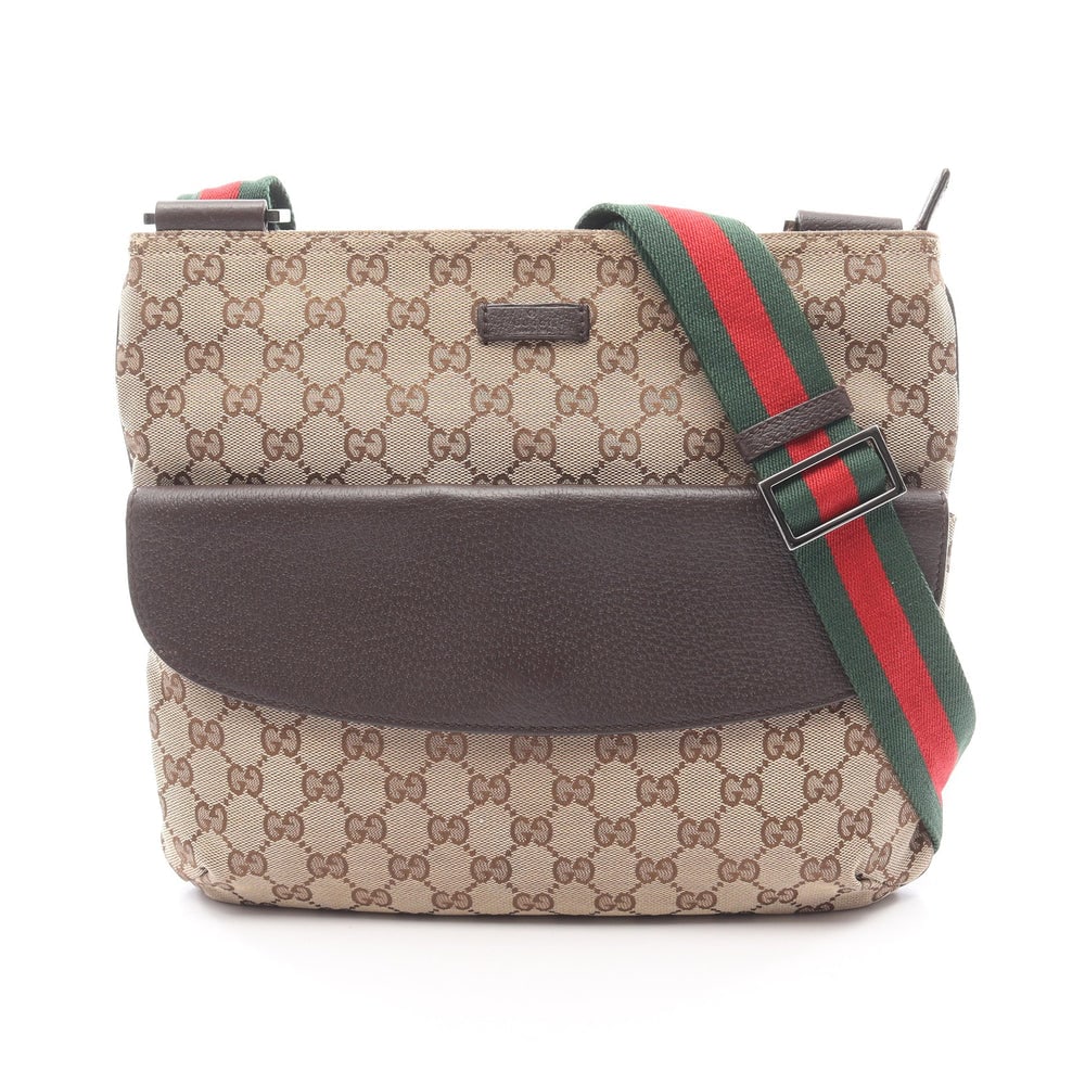 Gucci GG Sherry Shoulder Bag: Gucci GG canvas Sherry line shoulder bag in beige brown and multicolor canvas and leather.