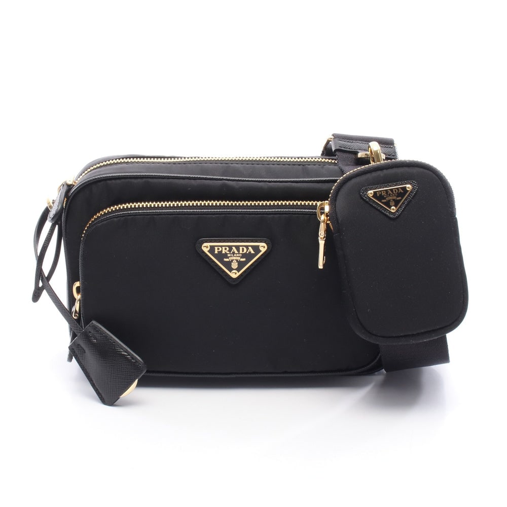 Prada Re-Nylon Mini Bag: Prada Re-Nylon mini shoulder bag in black nylon and leather.