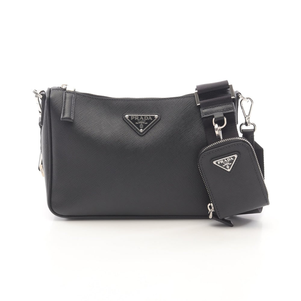 Prada Saffiano Travel Bag: Prada SAFFIANO TRAVEL shoulder bag in black leather.