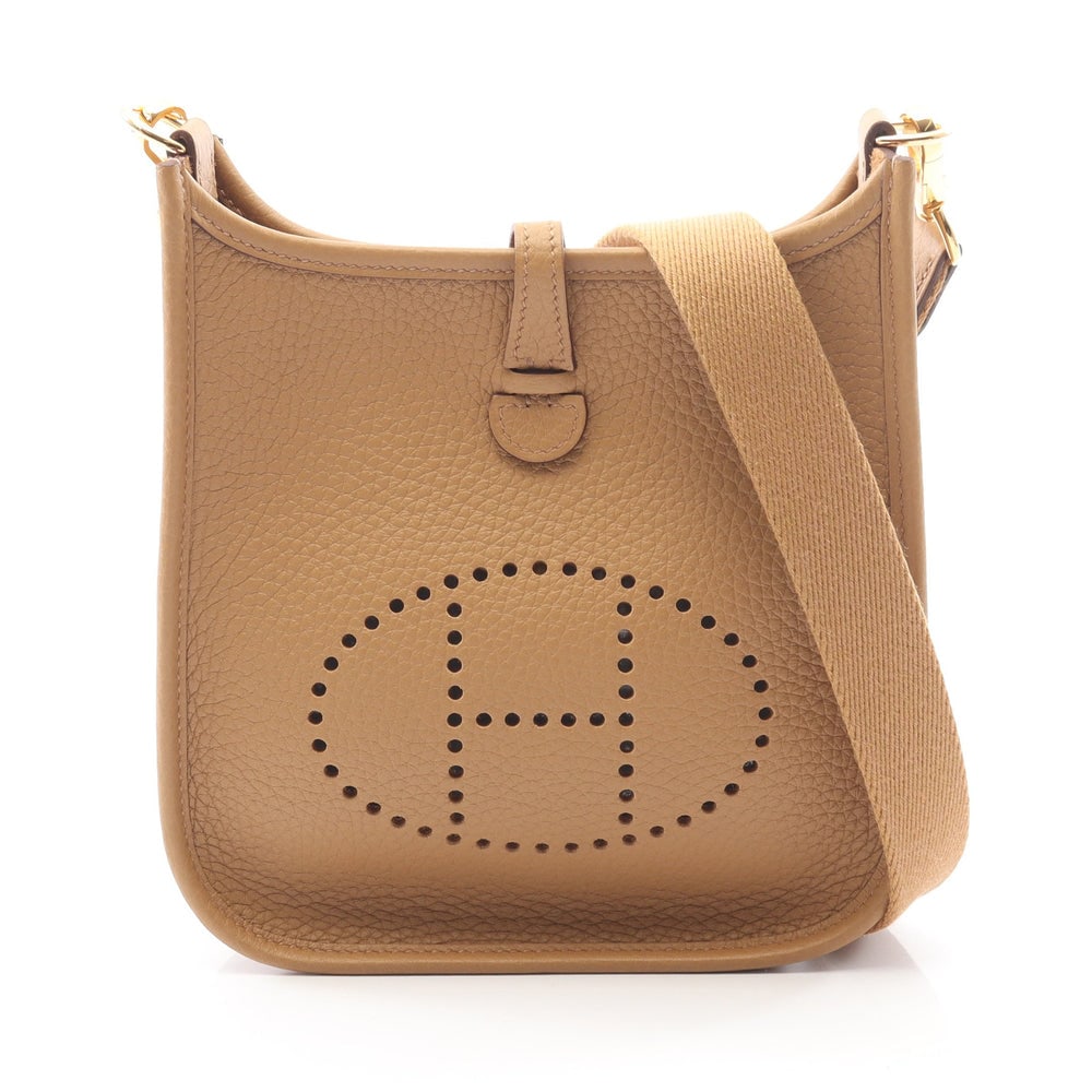 Hermes Evelyne TPM Sesame: Hermes Evelyne TPM Amazon shoulder bag in beige Clemence leather with gold hardware K stamp.