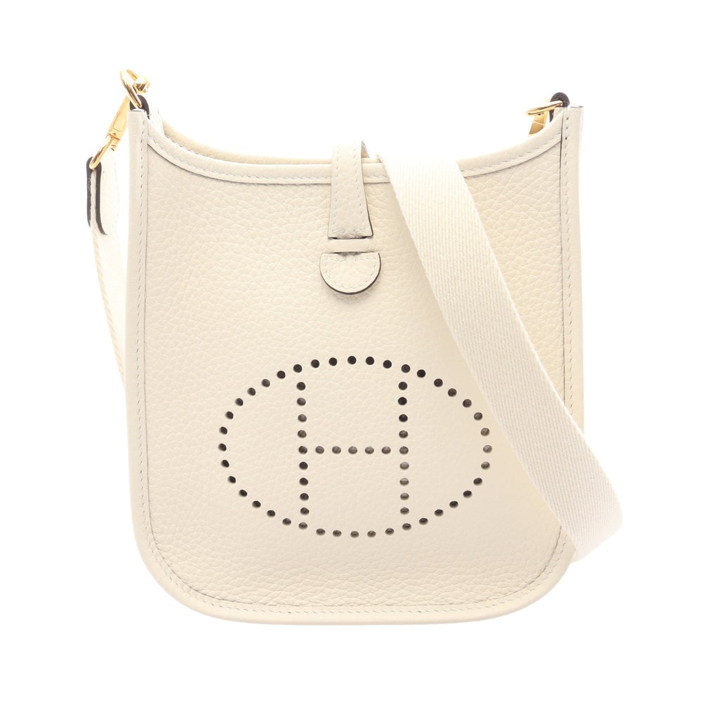 Hermes Evelyne TPM Ivory: Hermes Evelyne Amazon TPM shoulder bag in ivory Clemence leather with gold hardware K stamp.