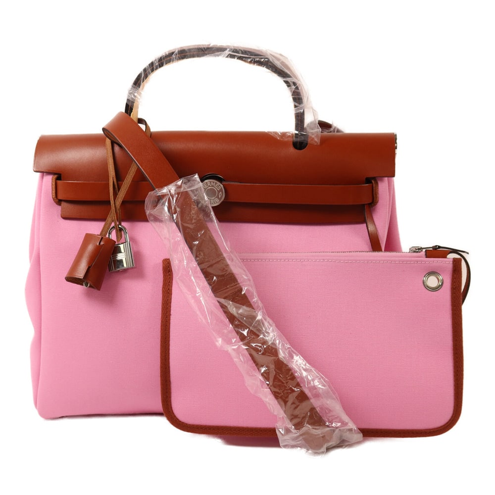 Hermes Herbag PM Rose Azalee: Hermes Herbag PM 2WAY shoulder bag in Rose Azalee canvas with silver hardware.
