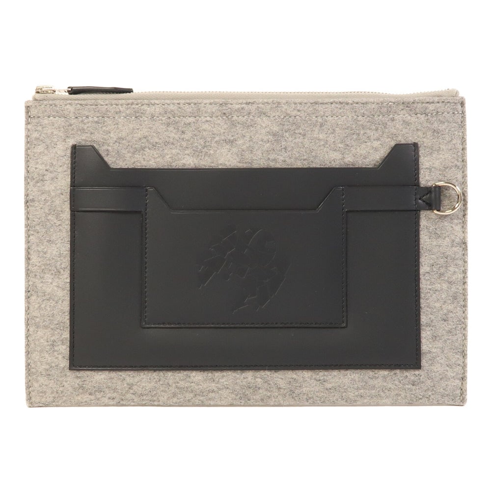 Hermes Toudou 29 Pouch Noir: Noir swift leather pouch. Includes box and storage bags. 29 x 20 x 1 cm.