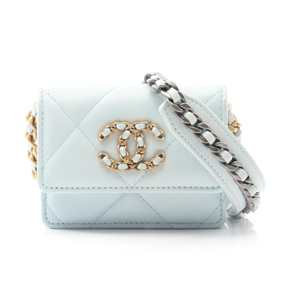 Chanel 19 Chain Wallet Blue: Light blue lambskin chain wallet. Includes guarantee card and serial seal. 10 x 10 x 0.5 cm.