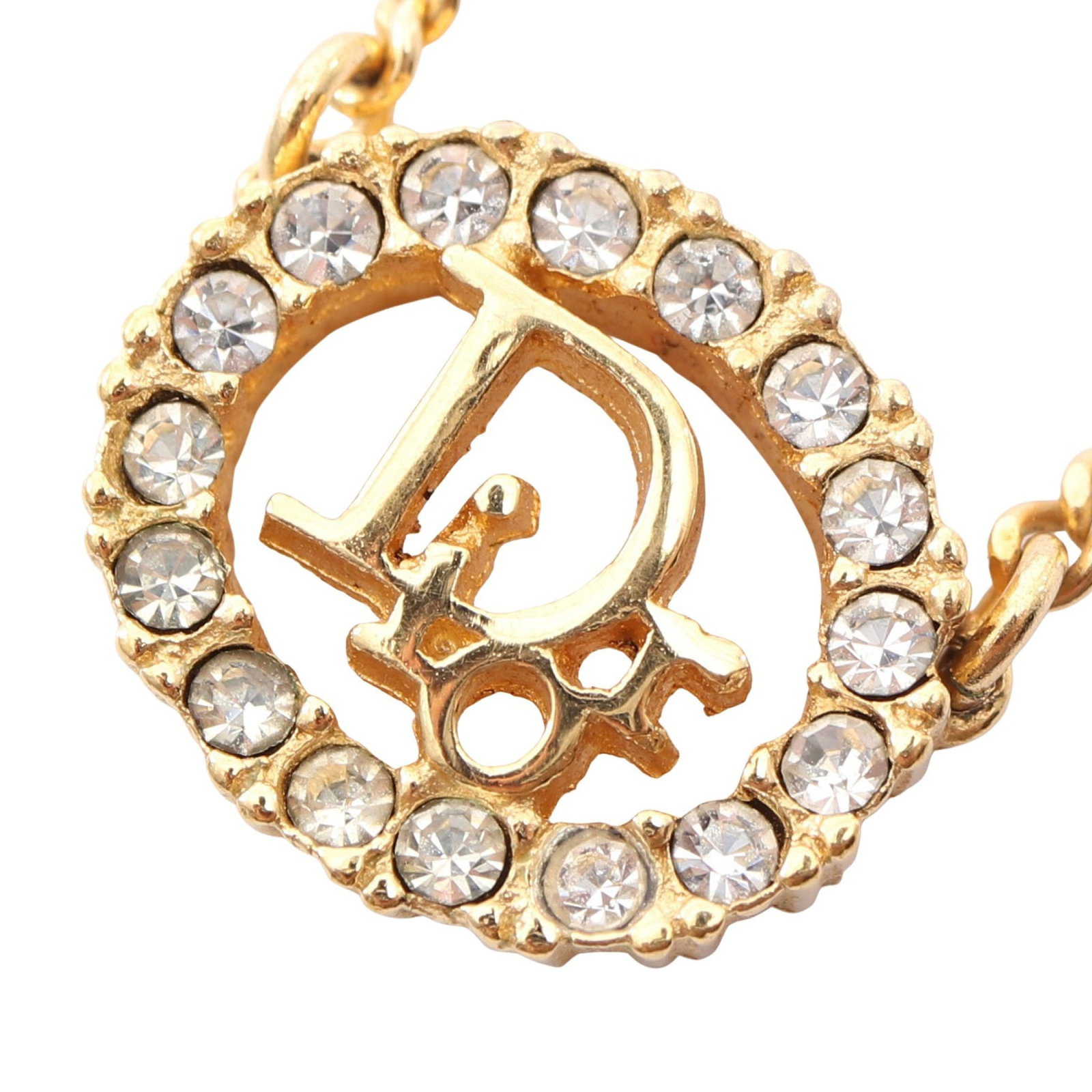 Dior Logo GP Gold Necklace: Logo necklace in gold plated finish with clear rhinestones.