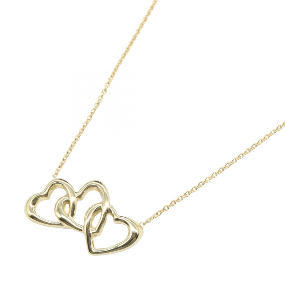 Tiffany Triple Heart Necklace: Triple Heart necklace in K18 yellow gold.