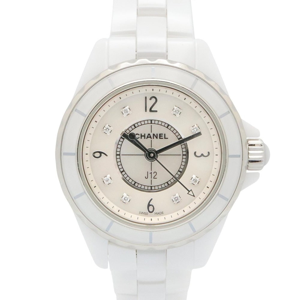Chanel J12 H2570 Quartz Diamond White: Quartz J12 H2570 in white ceramic with diamond and white shell details. Case 29mm, max wrist 14.5cm. Includes warranty.