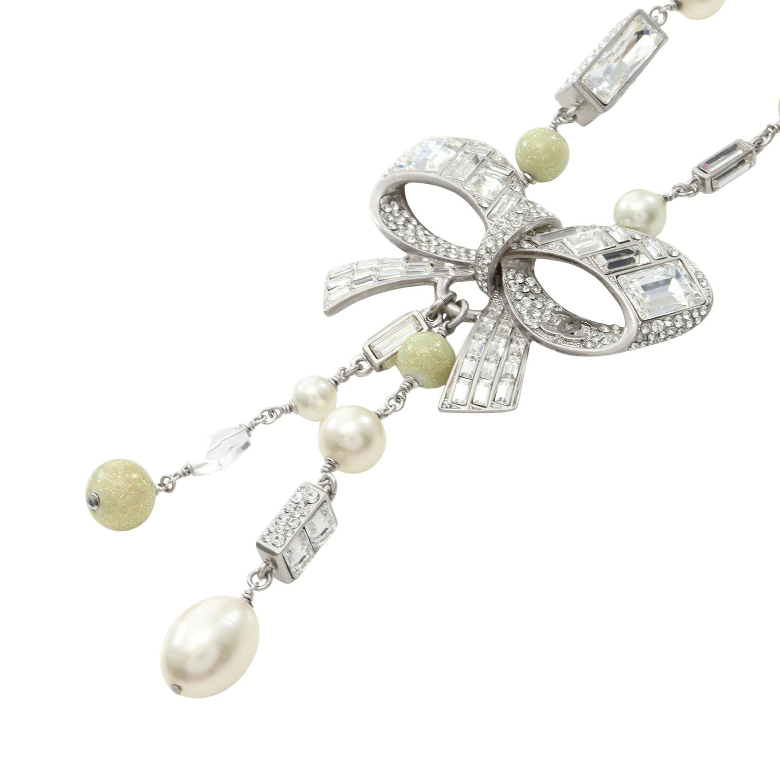 Chanel Ribbon Coco Mark Necklace: Coco Mark Ribbon necklace with fake pearl crystal and rhinestone in silver off white and clear tone.