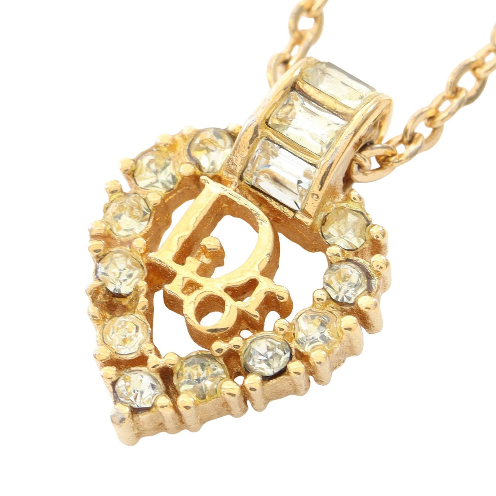 Dior Logo Heart GP Gold Necklace: Dior logo Heart necklace in gold plated finish with clear rhinestones.