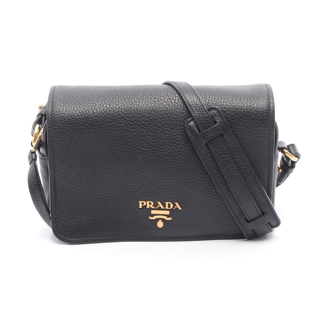 Prada Vitello Phenix Shoulder Black: Vitello Phenix shoulder bag in black leather. Size 22 x 15 x 6 cm. Strap 114-124 cm.
