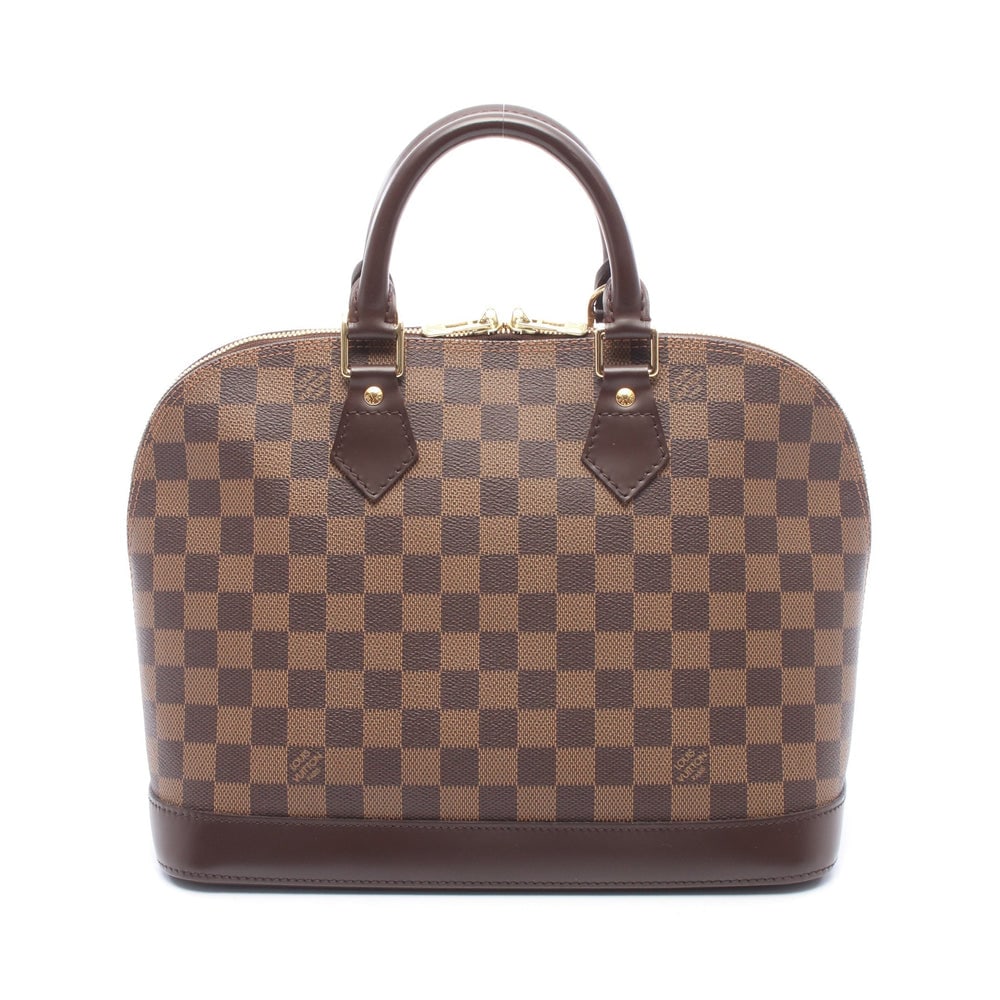 Louis Vuitton Alma Damier Brown: Alma handbag in brown Damier Ebene canvas. Size 31 x 23 x 15 cm.
