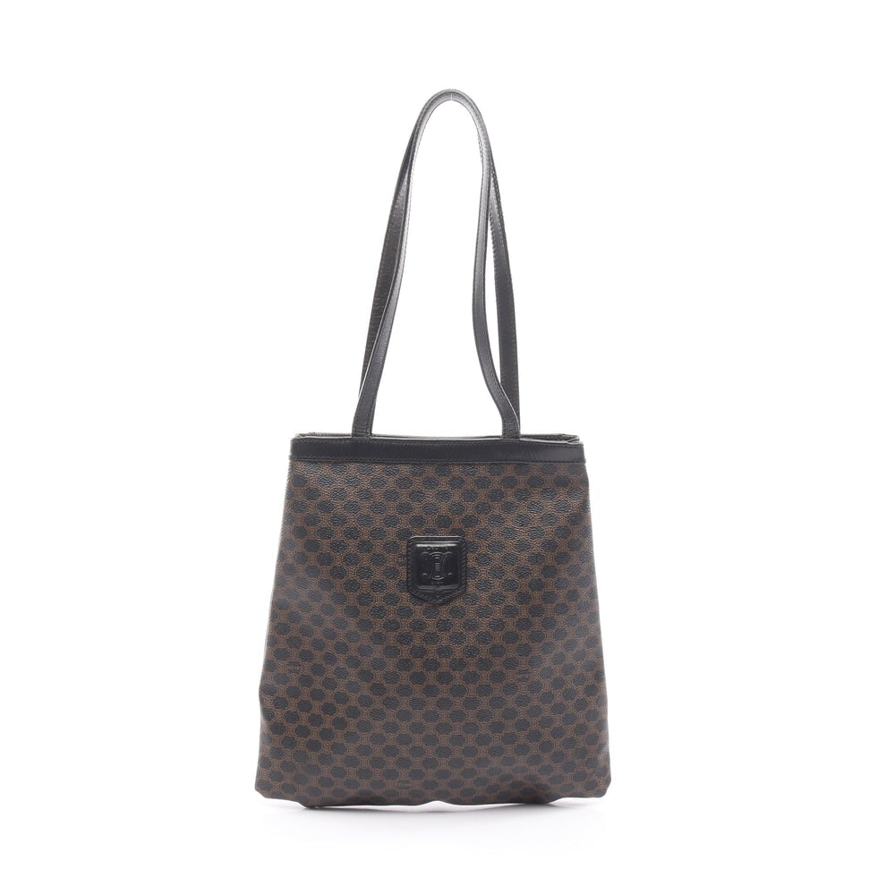 Celine Macadam Shoulder Tote Black Brown: Macadam shoulder tote in black and brown PVC and leather. Size 28 x 29 x 1 cm. Strap 55 cm.