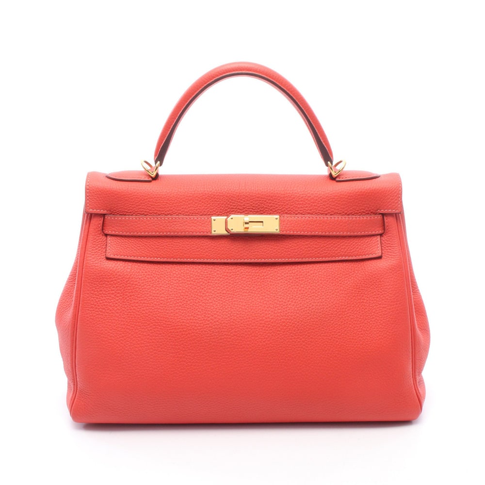Hermes Kelly 32 Rouge Pivoine: Pink red Togo inner stitch 2-way handbag with gold-tone hardware.