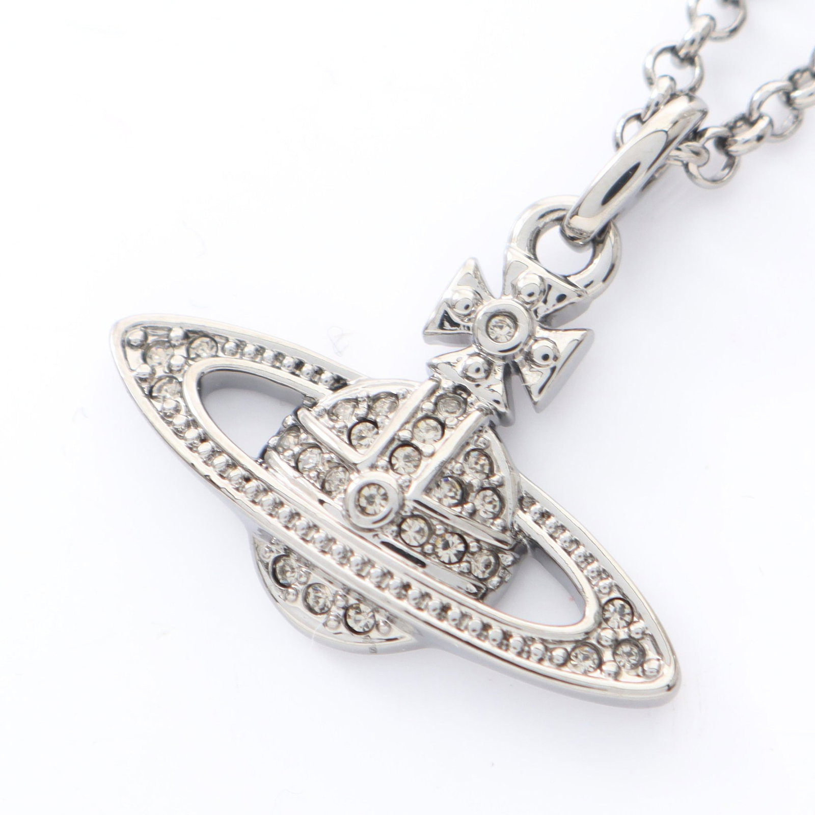 Vivienne Orb Necklace Silver Clear: Mini Bas Relief Orb necklace in silver tone with clear rhinestones.