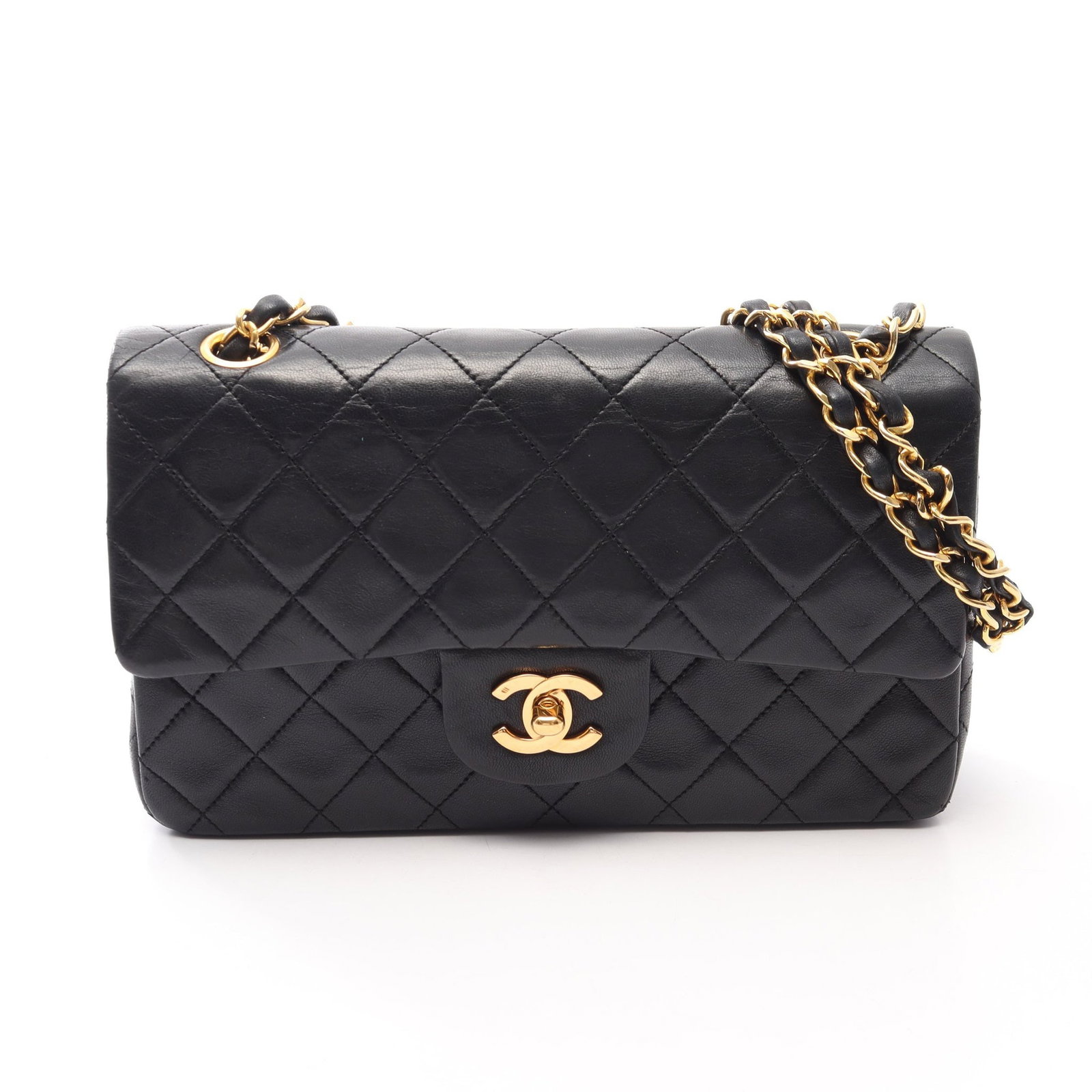 Chanel Double Flap Black: Black lambskin double flap double chain shoulder bag with gold-tone hardware.