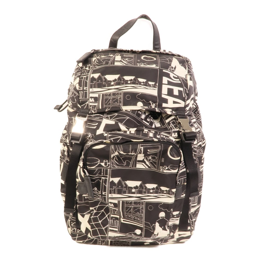 Prada Nylon Backpack Black White: Backpack in black and white nylon with silver-tone hardware. Size 27 x 12 x 40 cm.