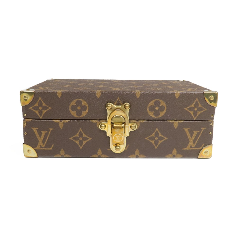 Louis Vuitton Coffret Jewelry Box: Brown monogram coated canvas jewelry box.