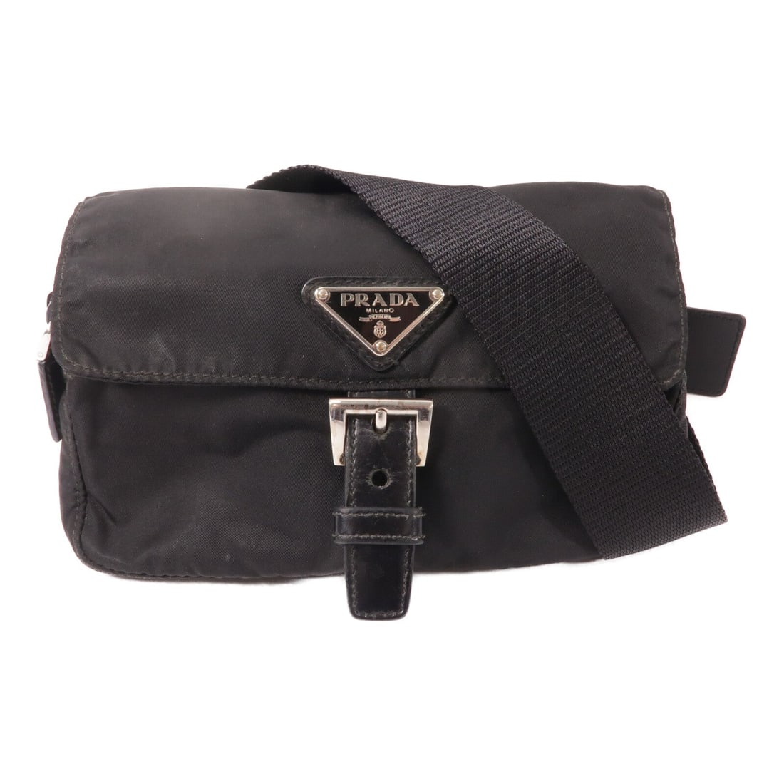Prada BM0012 Nylon Waist Bag Black: Nylon waist bag in black with silver-tone hardware. Includes shoulder strap. Size 19 x 12 x 5 cm. Strap 70 to 80 cm.