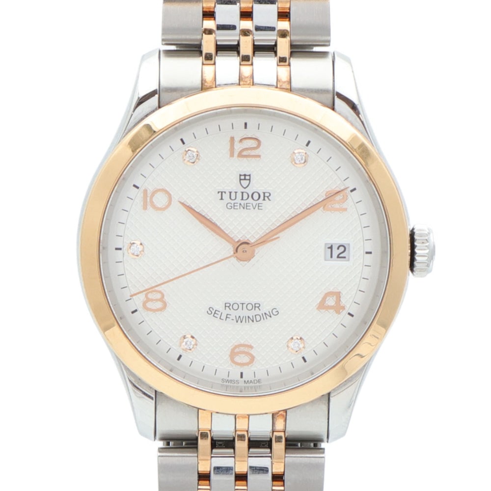 Tudor 1926 91451 Auto Steel Gold Silver: Automatic Tudor 1926 91451 in 18K yellow gold and stainless steel with silver dial. Case 36mm, max wrist 16.5cm, band 16-19mm. Includes storage box, guarantee and piece.