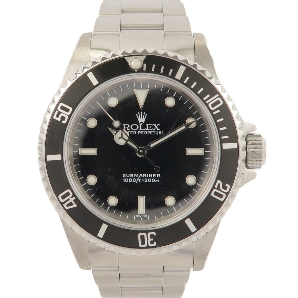 Rolex Submariner 14060 Automatic: Black automatic watch in stainless steel. 40mm case, max wrist 17cm.