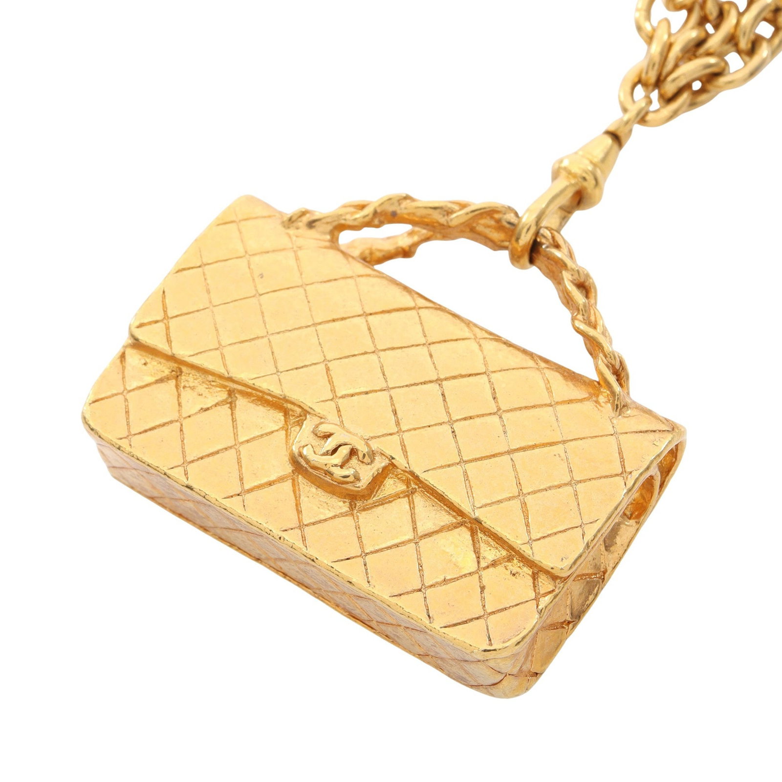 Chanel Matelasse Triple Necklace: Matelasse Bag motif triple necklace in gold plated finish.