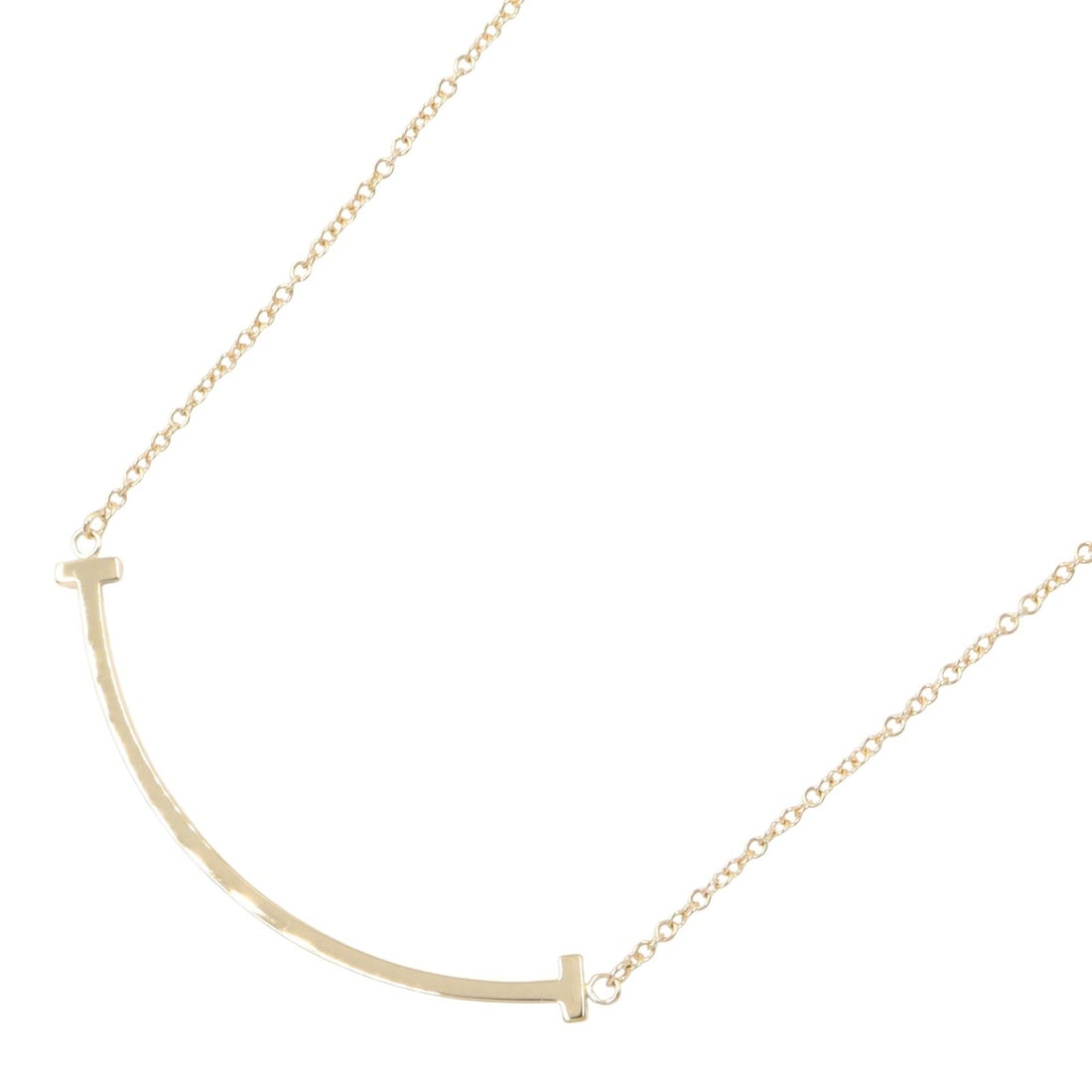 Tiffany T Smile Small Necklace: T Smile Small necklace in K18 yellow gold.