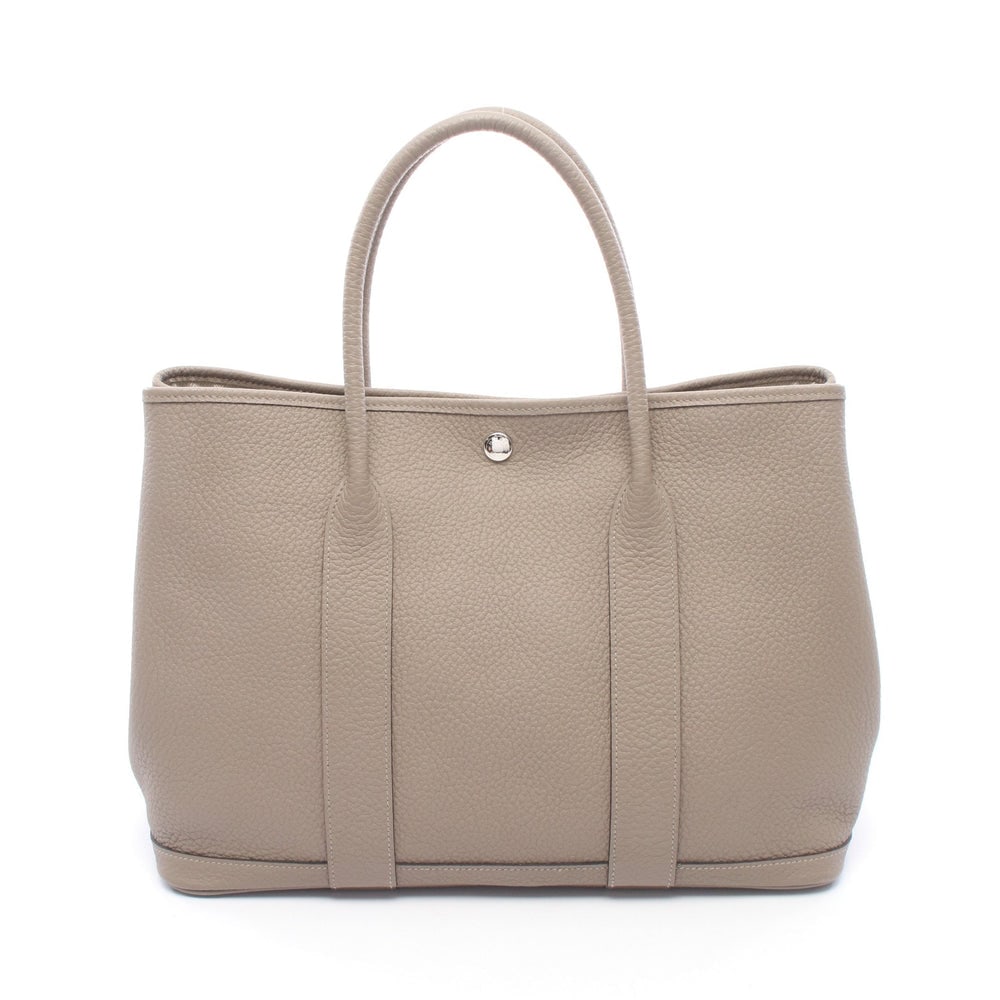 Hermes Garden Party PM Gris Asphalt: Grey beige country leather tote bag with silver-tone hardware.