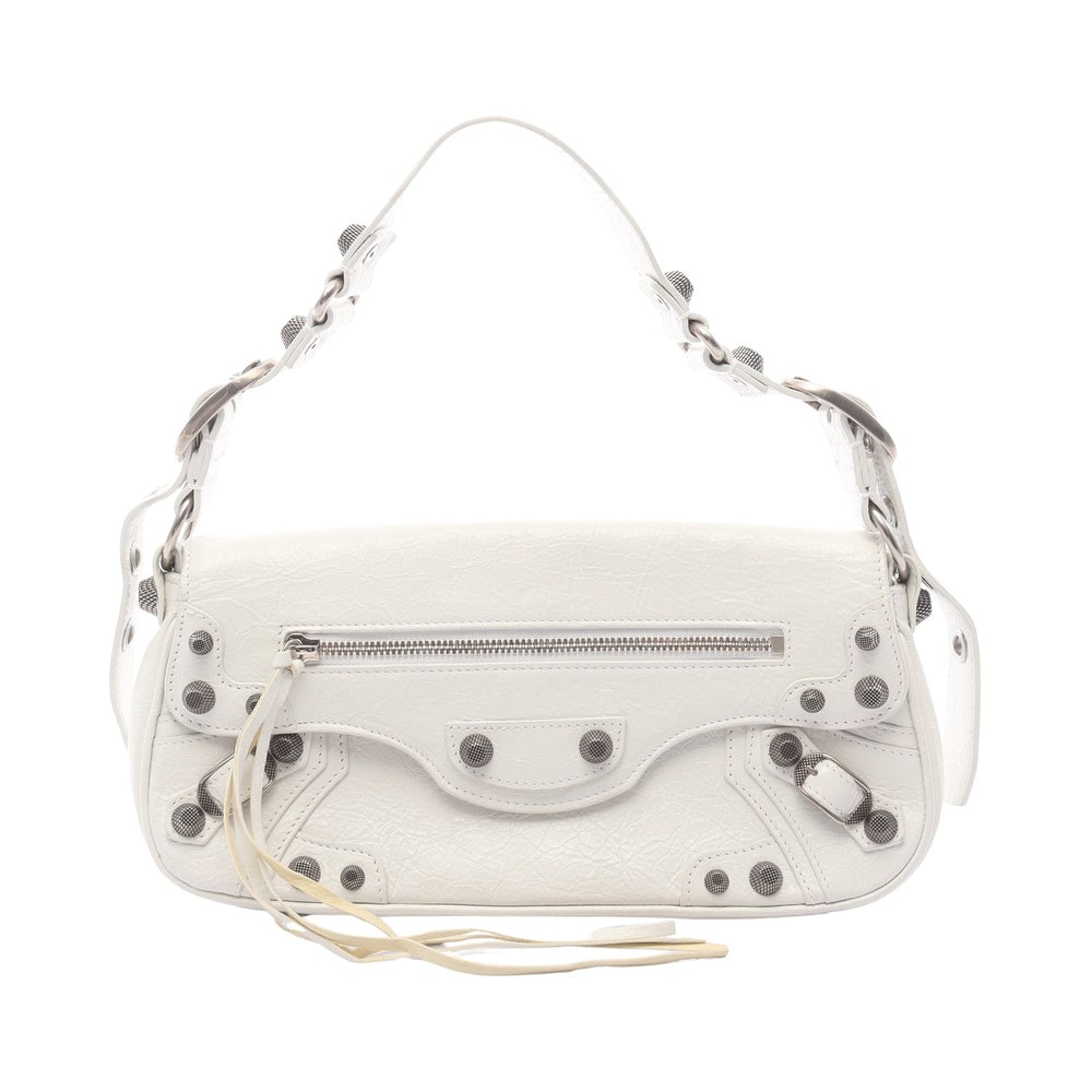Balenciaga Le Cagole Sling White: Le Cagole Small Sling bag in white leather. Size 27 x 15 x 3.5 cm. Handle 45 to 69 cm.