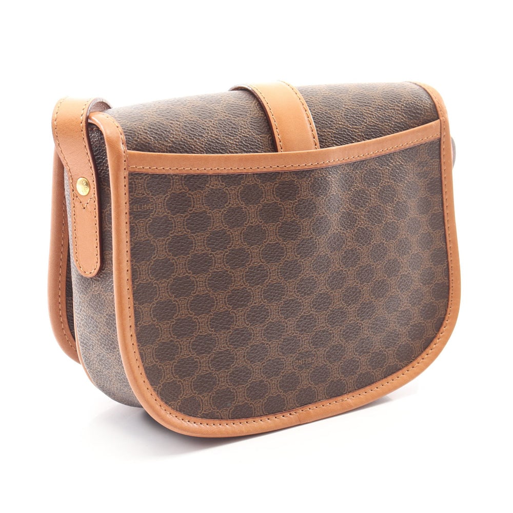 Celine Macadam Shoulder Dark Brown: Macadam shoulder bag in dark brown PVC and light brown leather. Size 20 x 17 x 5 cm.
