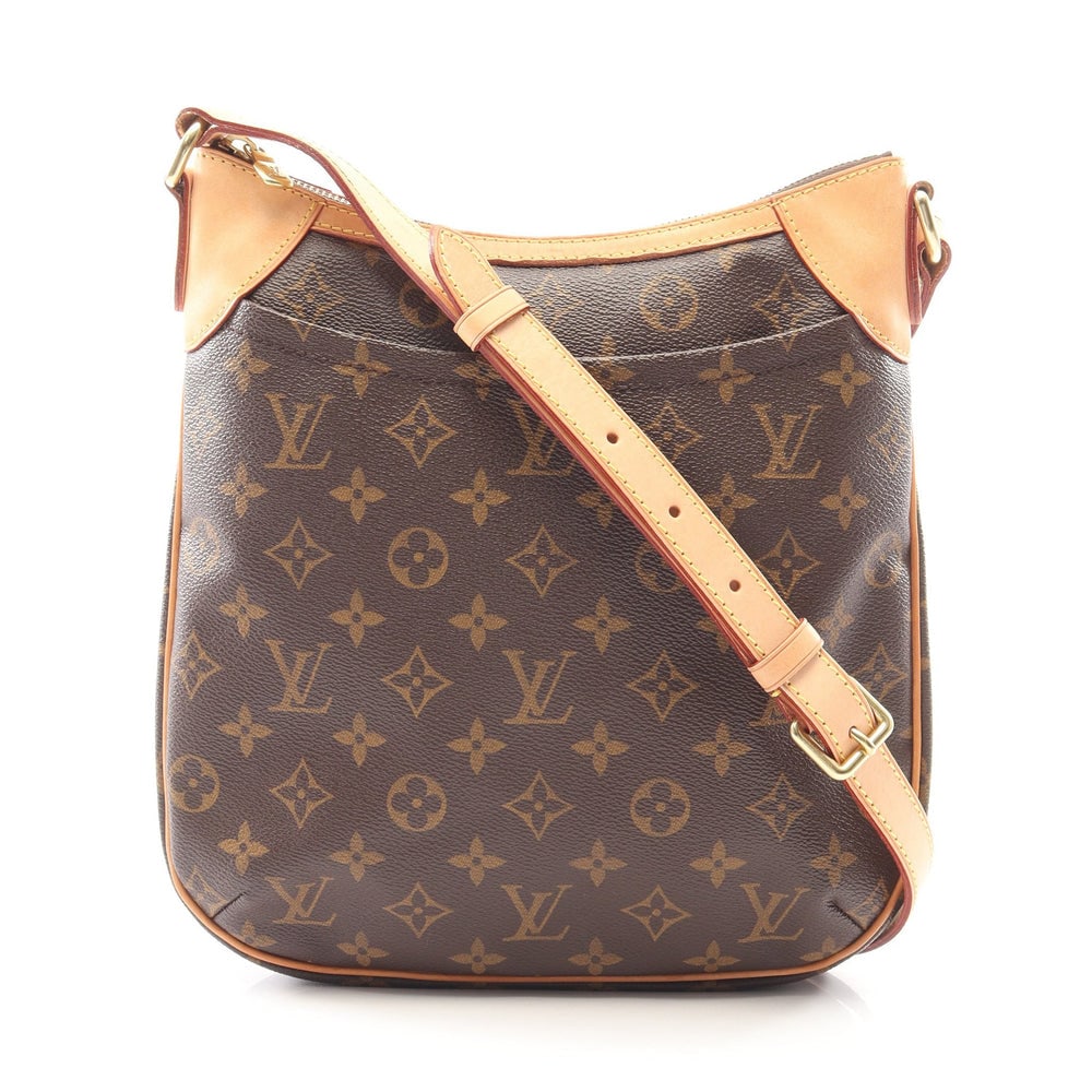 LV Odeon PM Monogram Shoulder: Monogram shoulder bag in brown PVC and leather. Size 25 x 27 x 4 cm. Strap 107-119 cm.