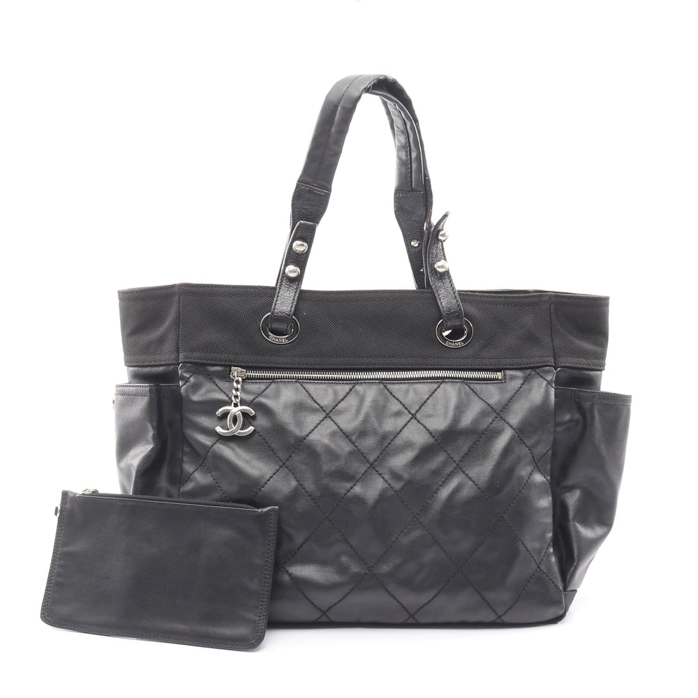Chanel Paris Biarritz GM Black: Paris Biarritz GM tote in black coated canvas and leather with silver-tone hardware. Size 34 x 30 x 14.5 cm.