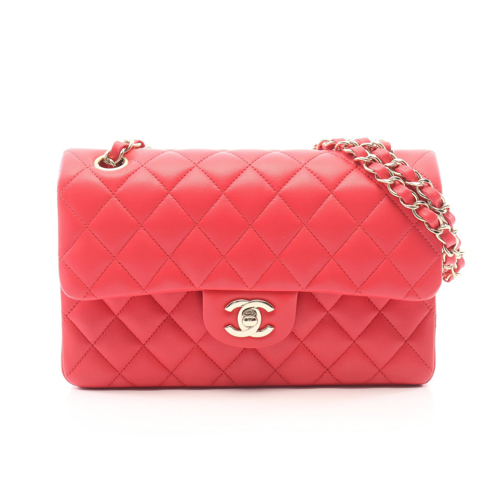 Chanel Double Flap Pink: Pink lambskin double flap double chain shoulder bag with gold-tone hardware.