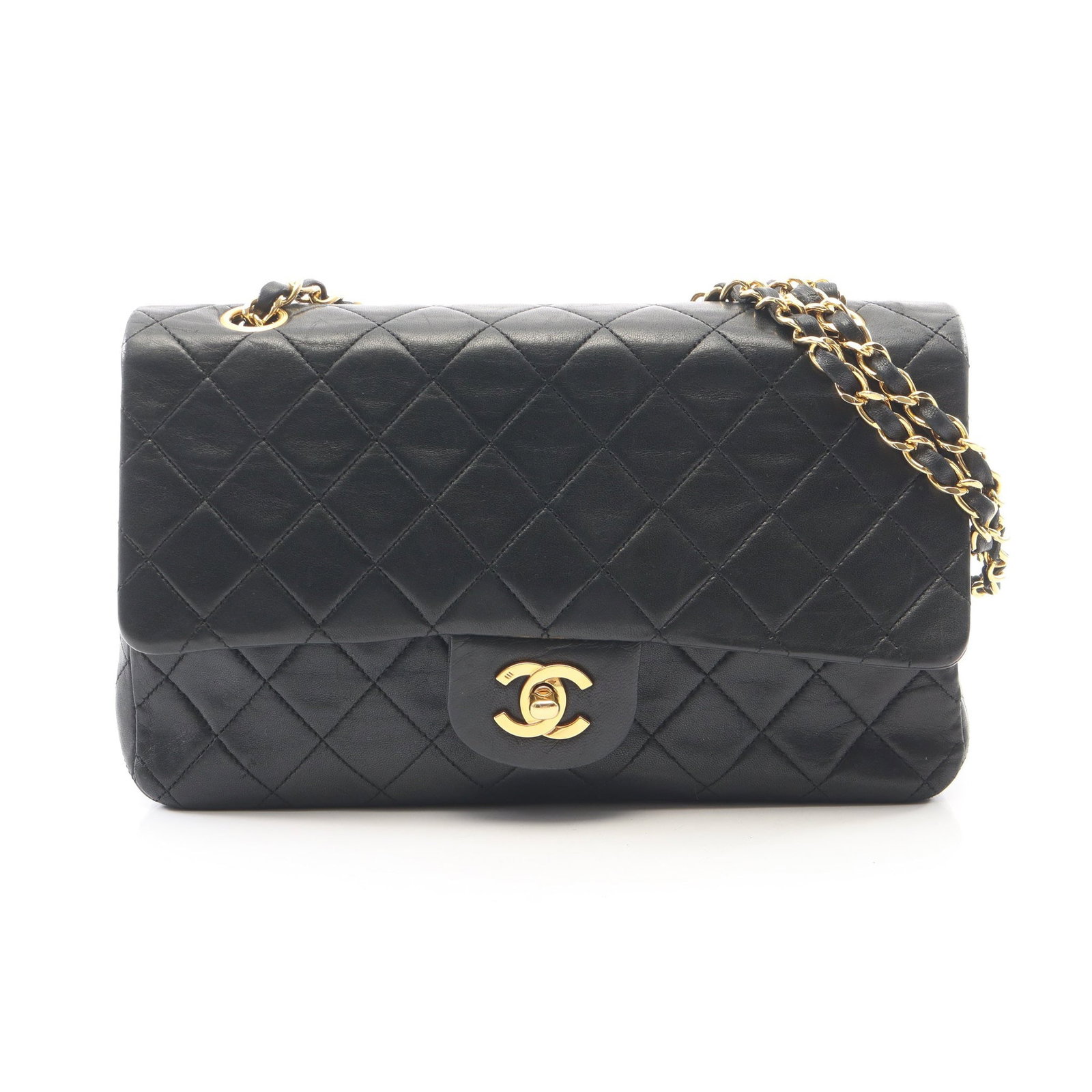 Chanel Vintage Double Flap Black: Black lambskin vintage double flap double chain shoulder bag.