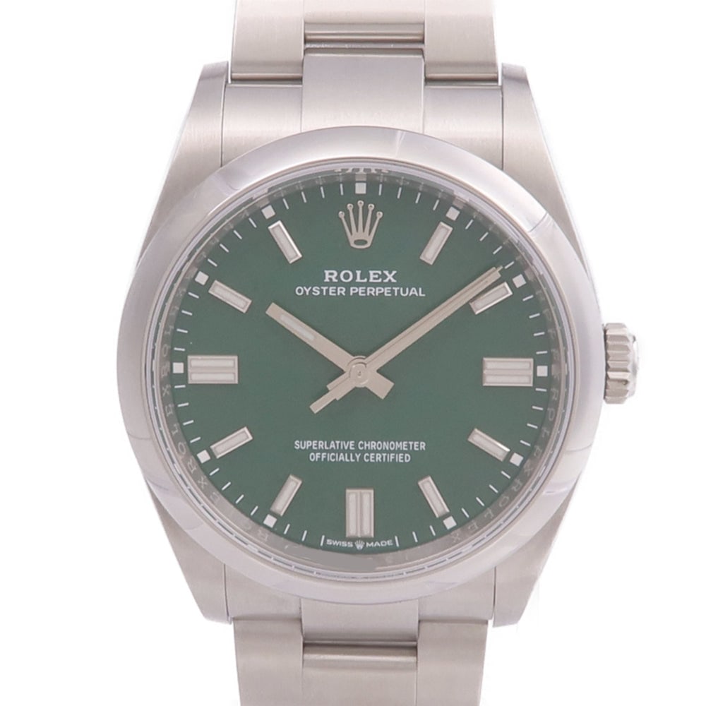 Rolex Oyster Perpetual 126000 Auto: Green automatic watch in stainless steel. Includes guarantee. 36mm case, max wrist 16cm.