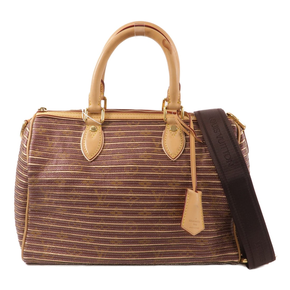 LV Speedy Bandouliere 30 Eden: Speedy Bandouliere 30 2 way shoulder bag M40357 in brown PVC coated canvas. Includes shoulder strap, clochette, key, and padlock. Size 30 x 20 x 17 cm.